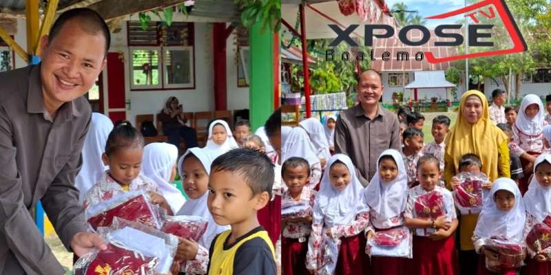 Harijanto Mamangkey Serahkan Bantuan Seragam Sekolah di SDN 11 Dulupi